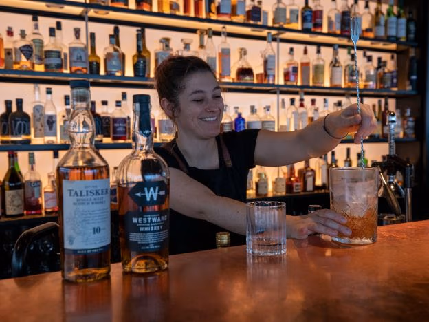 Whiskey bartender Tasmania credit Tourism Australia